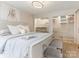 Large bedroom featuring hardwood floors, walk-in closets, and a neutral color palette at 212 W 10Th St # 3, Charlotte, NC 28202