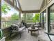 Relaxing outdoor patio area featuring comfortable seating and views of the surrounding trees at 212 W 10Th St # 3, Charlotte, NC 28202
