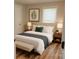 Serene bedroom with a plush bed, soft lighting, and stylish decor, creating a relaxing retreat at 216 N Vance St, Gastonia, NC 28052