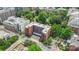 Aerial view of building near Fourth Ward Park, set among mature trees at 224 N Poplar St # 24, Charlotte, NC 28202