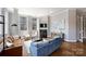 Stylish living room with a fireplace, comfortable seating, and a modern decor at 229 N Church St # 204, Charlotte, NC 28202
