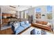 Bright living area with modern kitchen, fireplace, and comfortable seating at 229 N Church St # 204, Charlotte, NC 28202