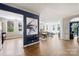 Spacious living room with hardwood floors, neutral paint, abundant natural light, and an open layout for seamless entertaining at 229 N Church St # 204, Charlotte, NC 28202