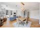 Spacious living room with ample seating, fireplace, and dining area with contemporary decor at 229 N Church St # 204, Charlotte, NC 28202