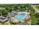 Aerial view of community pools and amenities with clubhouse, pools, tennis courts, and parking at 238 Horton Grove Rd, Fort Mill, SC 29715