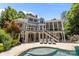The home features an expansive backyard with a pool and hot tub, stone patio, and multi-story design at 238 Horton Grove Rd, Fort Mill, SC 29715