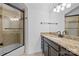Bathroom featuring a granite vanity, dark cabinets, and a glass-enclosed shower at 238 Horton Grove Rd, Fort Mill, SC 29715