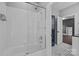 Bathroom featuring a tiled shower with glass door, and classic black-and-white flooring at 238 Horton Grove Rd, Fort Mill, SC 29715