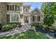 Charming front entrance with stone accents, complemented by manicured shrubs and a brick walkway at 238 Horton Grove Rd, Fort Mill, SC 29715