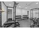 Bright home gym featuring weight rack, bench, mirrors and exercise equipment at 238 Horton Grove Rd, Fort Mill, SC 29715
