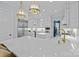 Bright open kitchen with stainless steel appliances, white marble countertops and adjacent butler's pantry at 238 Horton Grove Rd, Fort Mill, SC 29715