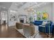 Bright open living room with coffered ceilings, fireplace, and large windows at 238 Horton Grove Rd, Fort Mill, SC 29715