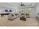 Bright living room featuring a pool table, comfortable seating, and a large window at 238 Horton Grove Rd, Fort Mill, SC 29715