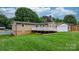 Expansive backyard with a large deck, perfect for outdoor entertaining at 2401 Hillside Dr, Newton, NC 28658