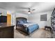 Spacious bedroom featuring a ceiling fan, a large bed, and a window at 2401 Hillside Dr, Newton, NC 28658