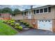 Inviting single-story home with a well-manicured lawn and integrated garage at 2401 Hillside Dr, Newton, NC 28658