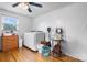 Spacious laundry area featuring modern washer and dryer, complemented by hardwood floors and neutral walls at 2401 Hillside Dr, Newton, NC 28658