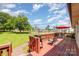 Outdoor deck featuring a gas grill, chairs, and a beautiful view at 2401 Hoffman St, Gastonia, NC 28054