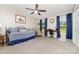 Bright bedroom with natural light, comfortable furnishings, and ample space for relaxing or working at 2401 Hoffman St, Gastonia, NC 28054
