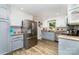 Bright kitchen featuring stainless steel appliances, ample cabinet space, and sleek countertops for cooking at 2401 Hoffman St, Gastonia, NC 28054