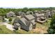 Back exterior view showcasing the home's screened porch and a fenced in yard at 2414 Madeira Cir, Waxhaw, NC 28173