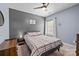 Comfortable bedroom featuring a ceiling fan, a double bed and neutral toned decor at 2414 Madeira Cir, Waxhaw, NC 28173