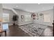 Bonus room with many windows, recessed lighting, hardwood flooring, and area rug at 2414 Madeira Cir, Waxhaw, NC 28173