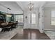 Stunning entryway with modern lighting, leading to a formal dining area at 2414 Madeira Cir, Waxhaw, NC 28173