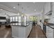 Open concept kitchen with a large island, stainless steel appliances, and plenty of counter space at 2414 Madeira Cir, Waxhaw, NC 28173