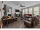 Inviting living room with a fireplace, comfortable seating, and plenty of natural light at 2414 Madeira Cir, Waxhaw, NC 28173