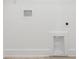 Unfinished basement area with hookups and light wood floors at 304 Adams St, Salisbury, NC 28144