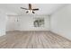 Spacious living room featuring neutral walls and wood-look flooring and lots of natural light at 304 Adams St, Salisbury, NC 28144