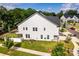 Home featuring an open backyard, patio, and well-manicured lawn from above at 4005 Easton Ridge Ln, Charlotte, NC 28226