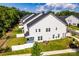 Aerial view showcases home's backyard, patio and surrounding greenery at 4005 Easton Ridge Ln, Charlotte, NC 28226