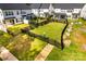 Spacious backyard with manicured lawn and black metal fence, perfect for outdoor activities and relaxation at 4005 Easton Ridge Ln, Charlotte, NC 28226