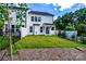 Private backyard with a well-kept lawn, patio, and secure fencing at 4005 Easton Ridge Ln, Charlotte, NC 28226