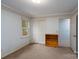 Bedroom offers neutral carpet, a large closet, and convenient access to other rooms at 403 Cherrywood Ln, Albemarle, NC 28001