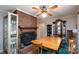 Charming dining room with brick fireplace and display cabinet for a blend of comfort and style at 403 Cherrywood Ln, Albemarle, NC 28001