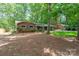 Ranch style home with brick exterior and a well-manicured front yard at 403 Cherrywood Ln, Albemarle, NC 28001