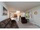 Bright living room with ample seating, decorative accents, and a comfortable layout at 403 Cherrywood Ln, Albemarle, NC 28001
