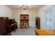 Home office featuring vintage furniture, including a piano and a writing desk at 403 Cherrywood Ln, Albemarle, NC 28001