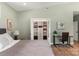 Primary bedroom view highlights a walk-in closet and desk, maximizing space and functionality at 4108 Commonwealth Ave, Charlotte, NC 28205
