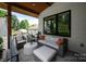 Outdoor porch seating area perfect for relaxing and entertaining at 4108 Commonwealth Ave, Charlotte, NC 28205