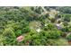 A beautiful aerial view of the home, nestled amongst a thick tree line at 4335 E Nc 10 Hwy, Claremont, NC 28610