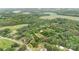 Aerial view of a wooded parcel of land with approximate property lines displayed at 4335 E Nc 10 Hwy, Claremont, NC 28610