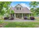 Charming home with lush landscaping, covered porch, and inviting curb appeal at 4335 E Nc 10 Hwy, Claremont, NC 28610