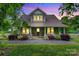 Charming home with lush landscaping, covered porch, and inviting curb appeal at 4335 E Nc 10 Hwy, Claremont, NC 28610