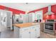 Bright kitchen featuring stainless steel appliances and a butcher block island at 4335 E Nc 10 Hwy, Claremont, NC 28610