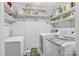 Laundry room with shelves, newer washer and dryer, and an upright freezer at 4335 E Nc 10 Hwy, Claremont, NC 28610