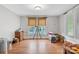 Bright living room features hardwood floors, and large windows offering natural light at 4335 E Nc 10 Hwy, Claremont, NC 28610